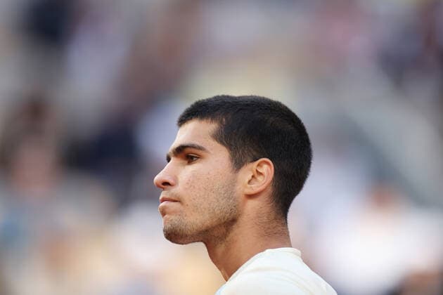(220601) -- PARIS, June 1, 2022 -- Carlos Alcaraz reacts during the men s singles quarterfinal between Germany s Alexander Zverev and Spain s Carlos Alcaraz at the French Open tennis tournament at Roland Garros in Paris, France, May 31, 2022. ) (SP)FRANCE-PARIS-TENNIS-ROLAND GARROS-FRENCH OPEN-MEN S SINGLES QUARTERFINAL GaoxJing 