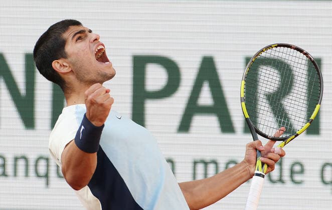 (220601) -- PARIS, June 1, 2022 -- Carlos Alcaraz reacts during the men s singles quarterfinal between Germany s Alexander Zverev and Spain s Carlos Alcaraz at the French Open tennis tournament at Roland Garros in Paris, France, May 31, 2022. ) (SP)FRANCE-PARIS-TENNIS-ROLAND GARROS-FRENCH OPEN-MEN S SINGLES QUARTERFINAL GaoxJing 