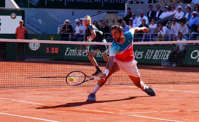 Mandatory Credit: Photo by Javier Garcia Shutterstock (12960004w) Marin Cilic returns against Andrey Rublev French Open Tennis, Day 11, Roland Garros, Paris, France - 01 Jun 2022 French Open Tennis, Day 11, Roland Garros, Paris, France - 01 Jun 2022  Copyright: xJavierxGarcia Shutterstockx 12960004w