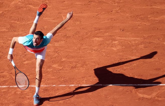 Marin Cilic of Bosnia-Herzegovina plays against Russian Andrey Rublev during their French Open tennis quarter final match at Roland Garros near Paris, France, on Wednesday, June 1, 2022.  PAR20220601129 MAYAxVIDON-WHITE