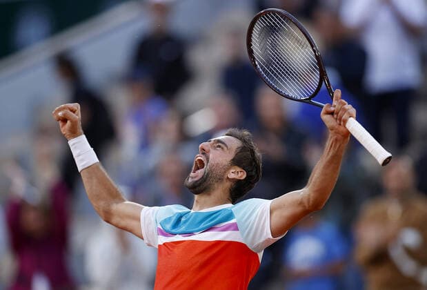 Mandatory Credit: Photo by Ella Ling Shutterstock (12959948aq) Marin Cilic of Croatia celebrates French Open Tennis, Day 11, Roland Garros, Paris, France - 01 Jun 2022 French Open Tennis, Day 11, Roland Garros, Paris, France - 01 Jun 2022  Copyright: xEllaxLing Shutterstockx 12959948aq