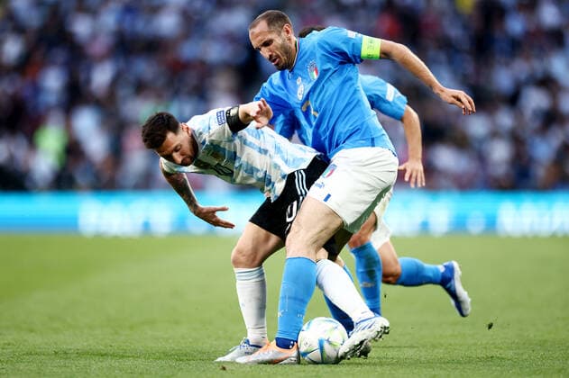 Mandatory Credit: Photo by James Marsh Shutterstock (12964971ab) Lionel Messi of Argentina is tackled by Giorgio Chiellini of Italy. Argentina v Italy, UEFA Finalissima 2022, Football, Wembley Stadium, London, UK - 01 Jun 2022 Argentina v Italy, UEFA Finalissima 2022, Football, Wembley Stadium, London, UK - 01 Jun 2022 Copyright: xJamesxMarsh Shutterstockx 12964971ab