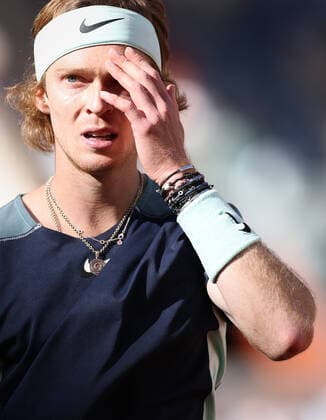 (220602) -- PARIS, June 2, 2022 -- Andrey Rublev reacts during the men s singles quarterfinal between Marin Cilic of Croatia and Andrey Rublev of Russia at the French Open tennis tournament at Roland Garros in Paris, France, June 1, 2022. ) (SP)FRANCE-PARIS-TENNIS-ROLAND GARROS-FRENCH OPEN-MEN S SINGLES QUARTERFINAL MengxDingbo 