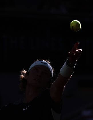 (220602) -- PARIS, June 2, 2022 -- Andrey Rublev serves the ball during the men s singles quarterfinal between Marin Cilic of Croatia and Andrey Rublev of Russia at the French Open tennis tournament at Roland Garros in Paris, France, June 1, 2022. ) (SP)FRANCE-PARIS-TENNIS-ROLAND GARROS-FRENCH OPEN-MEN S SINGLES QUARTERFINAL MengxDingbo 