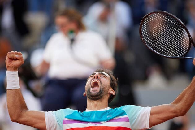 (220602) -- PARIS, June 2, 2022 -- Marin Cilic celebrates victory after the men s singles quarterfinal between Marin Cilic of Croatia and Andrey Rublev of Russia at the French Open tennis tournament at Roland Garros in Paris, France, June 1, 2022. ) (SP)FRANCE-PARIS-TENNIS-ROLAND GARROS-FRENCH OPEN-MEN S SINGLES QUARTERFINAL MengxDingbo 