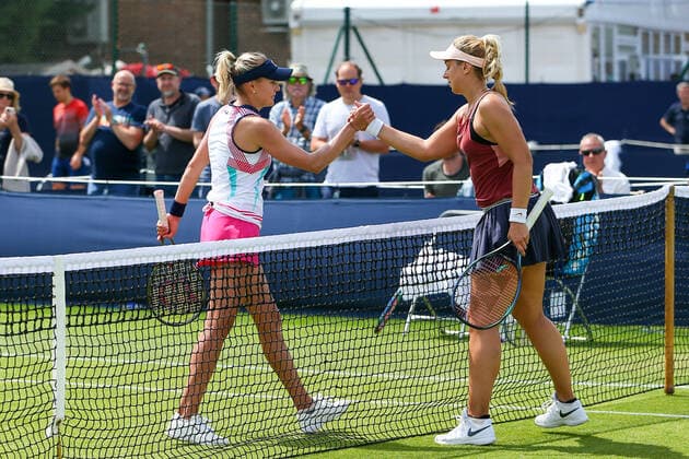 2nd June 2022; Surbiton Racket &amp; Fitness Club, Surbiton, London, England: Surbiton Trophy Tennis tournament: Kateryna Baindl (UKR) (L) shakes hands with Sabine Lisicki (GER) (R) after their match.  ActionPlus12395967 KatiexChan