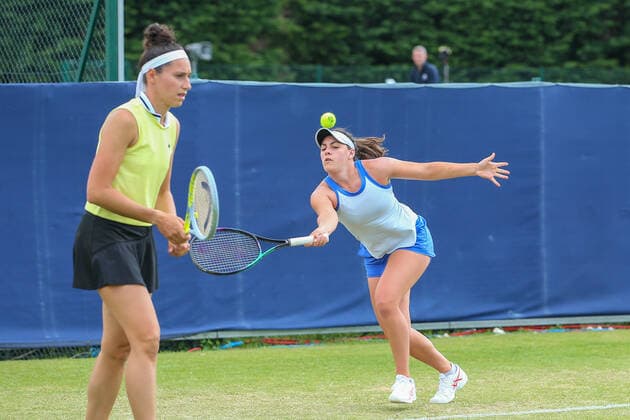 2nd June 2022; Surbiton Racket &amp; Fitness Club, Surbiton, London, England: Surbiton Trophy Tennis tournament: Ingrid Neel (USA) with her partner Rosalie Van der Hoek (NED) plays a forehand to Ingrid Gamarra Martins (BRA) and Emily Webley-Smith (GBR)  ActionPlus12396030 KatiexChan