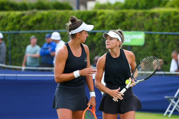 2nd June 2022; Surbiton Racket &amp; Fitness Club, Surbiton, London, England: Surbiton Trophy Tennis tournament: Ingrid Gamarra Martins (BRA) confers with Emily Webley-Smith (GBR) in their match against Ingrid Neel (USA) and Rosalie Van der Hoek (NED).  ActionPlus12396031 KatiexChan