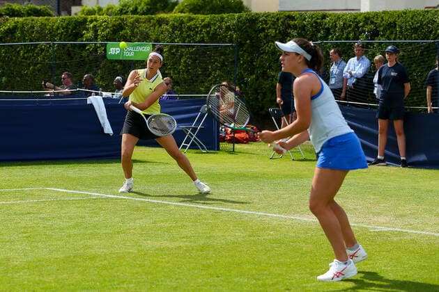 2nd June 2022; Surbiton Racket &amp; Fitness Club, Surbiton, London, England: Surbiton Trophy Tennis tournament: Rosalie Van der Hoek (NED) with her partner Ingrid Neel (USA) plays a forehand to Ingrid Gamarra Martins (BRA) and Emily Webley-Smith (GBR)  ActionPlus12396021 KatiexChan
