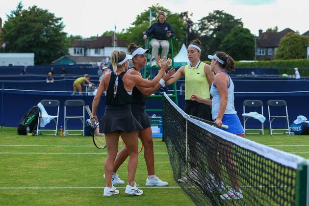 2nd June 2022; Surbiton Racket &amp; Fitness Club, Surbiton, London, England: Surbiton Trophy Tennis tournament: Ingrid Gamarra Martins (BRA) and Emily Webley-Smith (GBR) shakes hands with Ingrid Neel (USA) and Rosalie Van der Hoek (NED) after their match.  ActionPlus12396095 KatiexChan