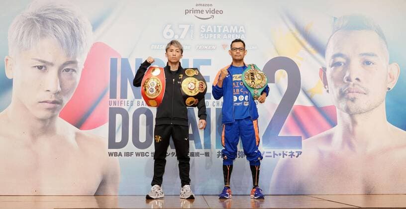 Sport Themen der Woche KW22 Sport Bilder des Tages Boxing: Inoue, Donaire meet before title unification bout WBA and IBF bantamweight champion Naoya Inoue of Japan (L) and WBC bantamweight champion Nonito Donaire of the Philippines pose for photographers in Yokohama, near Tokyo, on June 3, 2022, as they attend a press conference, PK, Pressekonferenz four days before their title unification boxing match at Saitama Super Arena. (Pool photo)  A14AA0001296573P