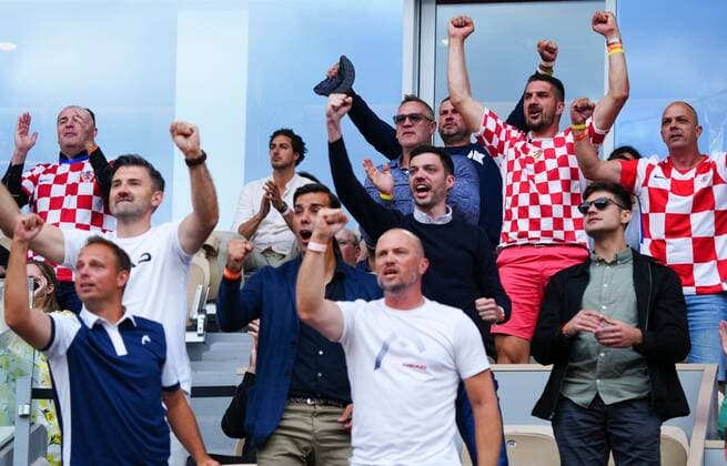 Mandatory Credit: Photo by Javier Garcia Shutterstock (12960013az) Supporters of Marin Cilic and his coaching staff celebrate him breaking in the first set to go 4-3 up French Open Tennis, Day 13, Roland Garros, Paris, France - 03 Jun 2022 French Open Tennis, Day 13, Roland Garros, Paris, France - 03 Jun 2022  Copyright: xJavierxGarcia Shutterstockx 12960013az