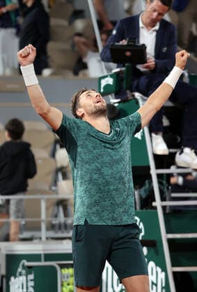Norway s Casper Ruud celebrates his victory against Marin Cilic of Croatia at the end of their semi-final match of the French Tennis Open at Roland Garros near Paris, France, on Friday, June 3, 2022. Ruud won 3-6, 6-4, 6-2, 6-2 and qualified for Sunday s final.  PAR20220603150 MAYAxVIDON-WHITE