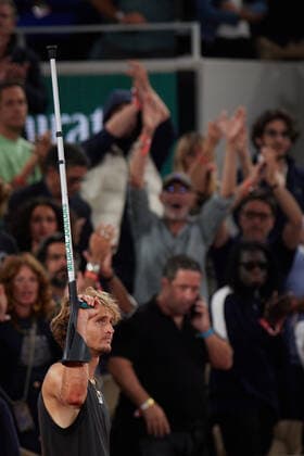 (220604) -- PARIS, June 4, 2022 -- Alexander Zverev with crutches gestures to spectators as he retires from the match after sustaining an injury during the men s singles semifinal match between Alexander Zverev of Germany and Rafael Nadal of Spain at the French Open tennis tournament at Roland Garros in Paris, France, June 3, 2022. ) (SP)FRANCE-PARIS-TENNIS-ROLAND GARROS-FRENCH OPEN-MEN S SINGLES SEMIFINAL MengxDingbo 