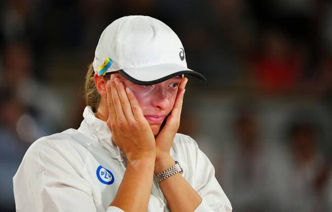 Mandatory Credit: Photo by Javier Garcia Shutterstock (12960014u) A tearful Iga Swiatek after the Polish national anthem was played French Open Tennis, Day 14, Roland Garros, Paris, France - 04 Jun 2022 French Open Tennis, Day 14, Roland Garros, Paris, France - 04 Jun 2022  Copyright: xJavierxGarcia Shutterstockx 12960014u