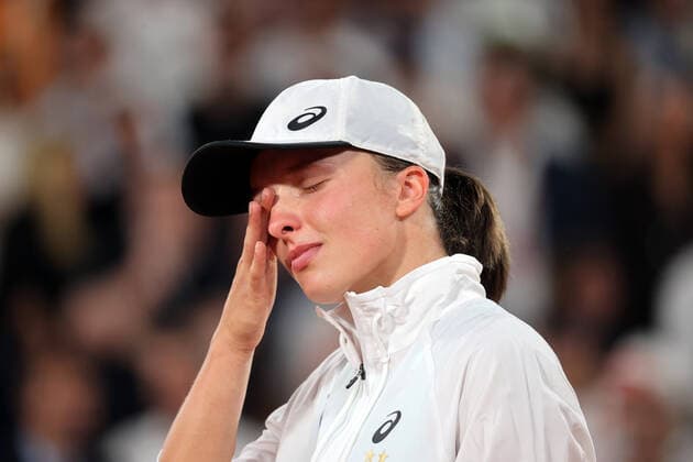 Iga Swiatek of Poland breaks into tears as she celebrates her victory against US Coco Gauff at the end of their final match at the French Tennis Open in Roland Garros near Paris, France, on Saturday, June 4, 2022. Swiatek won the title 6-1, 6-3.  PAR20220604137 MAYAxVIDON-WHITE