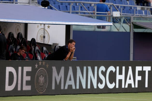 04 06 2022, Bologna, Italy, Renato Dall Ara , Italy vs Germany UEFA Nations League Path A Group 2, Manager Oliver Bierhof Germany gestures, gestures with the logo The team Photo H Langer Bologna Renato Dall Ara Emilia Romagna Italy  541_ITAGER20220604_004 Langer-541