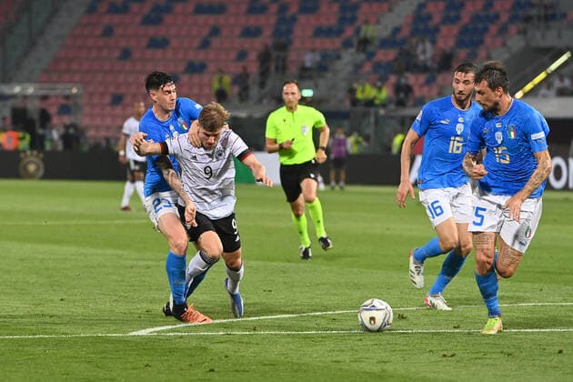 Alessandro BASTONI ITA , Action,Tackle against Timo WERNER GER , Football UEFA Nations League,Group Stage 1 Matchday Italy ITA Germany GER , on 04 06 2022, Renato Dall Ara Stadium Bologna