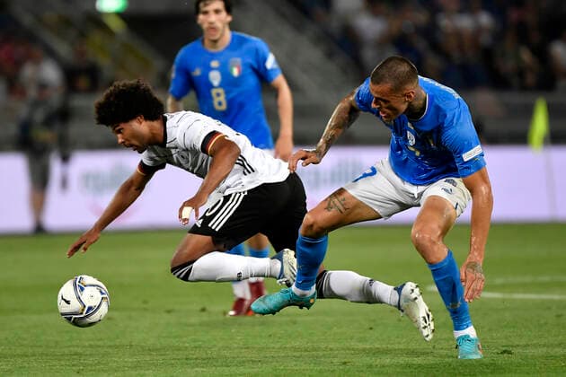 Serge Gnabry of Germany and Gianluca Scamacca of Italy compete for the ball during the Uefa Nations League group 3 football match between Italy and Germany at Renato Dall Ara stadium in Bologna (Italy), June 4th, 2022. Photo Andrea Staccioli Insidefoto andreaxstaccioli