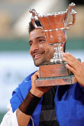 4th June 2022; Roland Garros, Paris, France: French Open Tennis tournament, mens doubles final; Marcelo Arevalo (ELS) holds the mens doubles winner s trophy after his game against I Dodig (CRO) and A Kraijcek (USA)  ActionPlus12397000 JonxBromley