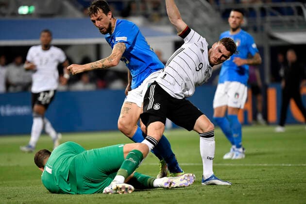Gianluigi Donnarumma of Italy saves on Timo Werner of Germany, challenged by Francesco Acerbi of Italy during the Uefa Nations League group 3 football match between Italy and Germany at Renato Dall Ara stadium in Bologna (Italy), June 4th, 2022. Photo Andrea Staccioli Insidefoto andreaxstaccioli