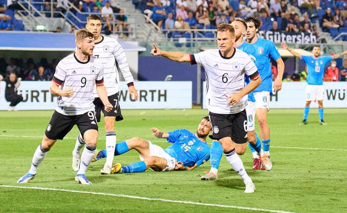 Joshua Kimmich, DFB 6 scores, shoots goal , Tor, Treffer, Torschuss, 1-1, celebrates his goal, happy, laugh, celebration, in the UEFA Nations League 2022 match ITALY - GERMANY in Season 2022 2023 on Juni 04, 2022 in Bologna, Italy.