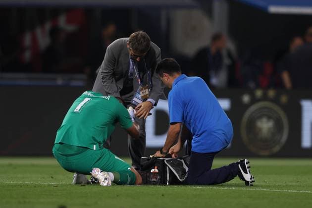 Bologna, Italy, 4th June 2022. Gianluigi Donnarumma of Italy receives medical assistance after injuring his wrist during the UEFA Nations League match at Stadio Renato Dall Ara, Bologna. Picture credit should read: Jonathan Moscrop Sportimage EDITORIAL USE ONLY. No use with unauthorised audio, video, data, fixture lists, club league logos or live services. Online in-match use limited to 120 images, no video emulation. No use in betting, games or single club league player publications. SPI-1724-0016
