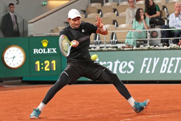 4th June 2022; Roland Garros, Paris, France: French Open Tennis tournament: Marcelo Arevalo (ELS) during his mens doubles match against Ivan Dodig (CRO)and Austin Krajicek (USA)  ActionPlus12397028 JonxBromley