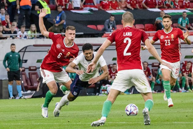 (220605) -- BUDAPEST, June 5, 2022 -- Hungary s Willi Orban (1st L) vies with England s Jude Bellingham (2nd L) during the UEFA Nations League A Group 3 match between Hungary and England at the Puskas Arena stadium in Budapest, Hungary on June 4, 2022. (Photo by Xinhua) (SP) HUNGARY-BUDAPEST-FOOTBALL-UEFA NATIONS LEAGUE-HUNGARY VS ENGLAND AttilaxVolgyi 