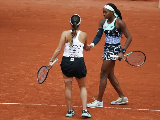(220605) -- PARIS, June 5, 2022 -- Coco Gauff (R) Jessica Pegula of the United States react during the women s doubles final against Kristina Mladenovic Caroline Garcia of France at the French Open tennis tournament at Roland Garros in Paris, France, June 5, 2022. ) (SP)FRANCE-PARIS-TENNIS-ROLAND GARROS-FRENCH OPEN-WOMEN S DOUBLES FINAL GaoxJing 