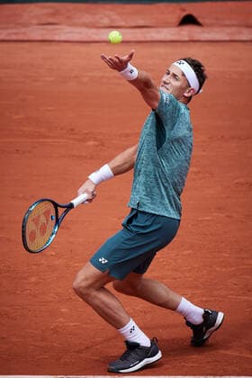 (220605) -- PARIS, June 5, 2022 -- Casper Ruud of Norway serves during the men s singles final against Rafael Nadal of Spain at the French Open tennis tournament at Roland Garros in Paris, France, June 5, 2022. ) (SP)FRANCE-PARIS-TENNIS-ROLAND GARROS-FRENCH OPEN-MEN S SINGLES FINAL MengxDingbo 