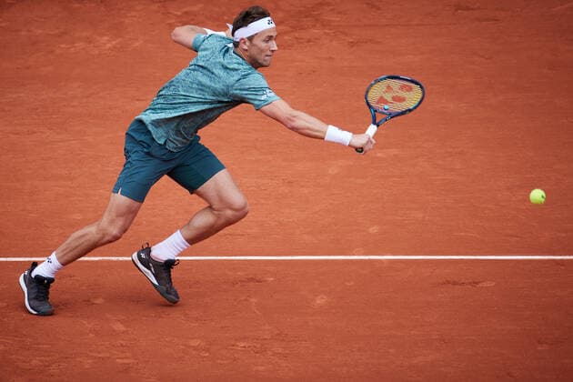 (220605) -- PARIS, June 5, 2022 -- Casper Ruud of Norway hits a return during the men s singles final against Rafael Nadal of Spain at the French Open tennis tournament at Roland Garros in Paris, France, June 5, 2022. ) (SP)FRANCE-PARIS-TENNIS-ROLAND GARROS-FRENCH OPEN-MEN S SINGLES FINAL MengxDingbo 