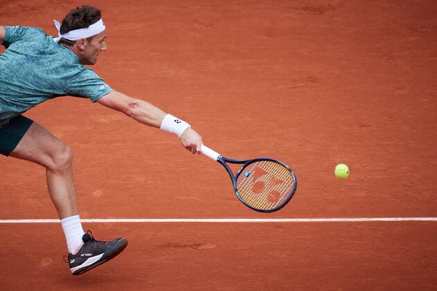 (220605) -- PARIS, June 5, 2022 -- Casper Ruud of Norway hits a return during the men s singles final against Rafael Nadal of Spain at the French Open tennis tournament at Roland Garros in Paris, France, June 5, 2022. ) (SP)FRANCE-PARIS-TENNIS-ROLAND GARROS-FRENCH OPEN-MEN S SINGLES FINAL MengxDingbo 