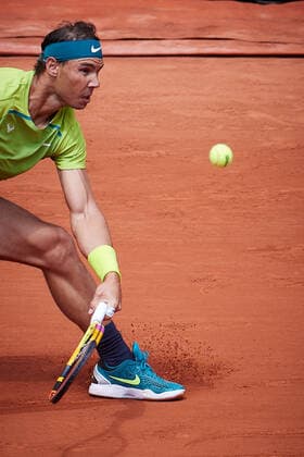 (220605) -- PARIS, June 5, 2022 -- Rafael Nadal of Spain hits a return during the men s singles final against Casper Ruud of Norway at the French Open tennis tournament at Roland Garros in Paris, France, June 5, 2022. ) (SP)FRANCE-PARIS-TENNIS-ROLAND GARROS-FRENCH OPEN-MEN S SINGLES FINAL MengxDingbo 