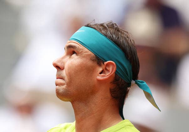 (220605) -- PARIS, June 5, 2022 -- Rafael Nadal of Spain reacts during the men s singles final against Casper Ruud of Norway at the French Open tennis tournament at Roland Garros in Paris, France, June 5, 2022. ) (SP)FRANCE-PARIS-TENNIS-ROLAND GARROS-FRENCH OPEN-MEN S SINGLES FINAL GaoxJing 