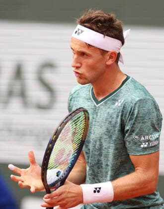 (220605) -- PARIS, June 5, 2022 -- Casper Ruud of Norway reacts during the men s singles final against Rafael Nadal of Spain at the French Open tennis tournament at Roland Garros in Paris, France, June 5, 2022. ) (SP)FRANCE-PARIS-TENNIS-ROLAND GARROS-FRENCH OPEN-MEN S SINGLES-FINAL GaoxJing 