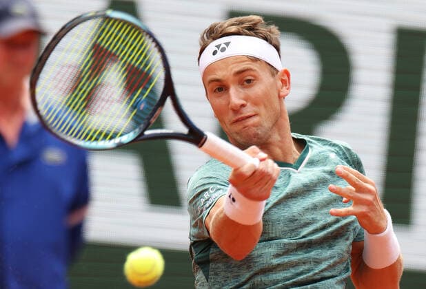 (220605) -- PARIS, June 5, 2022 -- Casper Ruud of Norway hits a return during the men s singles final against Rafael Nadal of Spain at the French Open tennis tournament at Roland Garros in Paris, France, June 5, 2022. ) (SP)FRANCE-PARIS-TENNIS-ROLAND GARROS-FRENCH OPEN-MEN S SINGLES-FINAL GaoxJing 