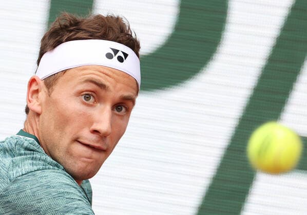 (220605) -- PARIS, June 5, 2022 -- Casper Ruud of Norway hits a return during the men s singles final against Rafael Nadal of Spain at the French Open tennis tournament at Roland Garros in Paris, France, June 5, 2022. ) (SP)FRANCE-PARIS-TENNIS-ROLAND GARROS-FRENCH OPEN-MEN S SINGLES-FINAL GaoxJing 