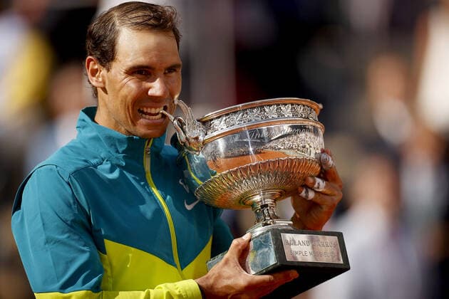 Mandatory Credit: Photo by Ella Ling Shutterstock (12959954r) Rafael Nadal of Spain celebrates with the trophy French Open Tennis, Day 15, Roland Garros, Paris, France - 05 Jun 2022 French Open Tennis, Day 15, Roland Garros, Paris, France - 05 Jun 2022  Copyright: xEllaxLing Shutterstockx 12959954r