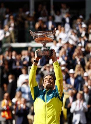 Mandatory Credit: Photo by Ella Ling Shutterstock (12959954i) Rafael Nadal of Spain celebrates with the trophy French Open Tennis, Day 15, Roland Garros, Paris, France - 05 Jun 2022 French Open Tennis, Day 15, Roland Garros, Paris, France - 05 Jun 2022  Copyright: xEllaxLing Shutterstockx 12959954i