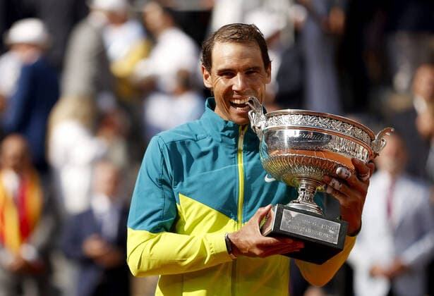 Mandatory Credit: Photo by Ella Ling Shutterstock (12959954g) Rafael Nadal of Spain celebrates with the trophy French Open Tennis, Day 15, Roland Garros, Paris, France - 05 Jun 2022 French Open Tennis, Day 15, Roland Garros, Paris, France - 05 Jun 2022  Copyright: xEllaxLing Shutterstockx 12959954g