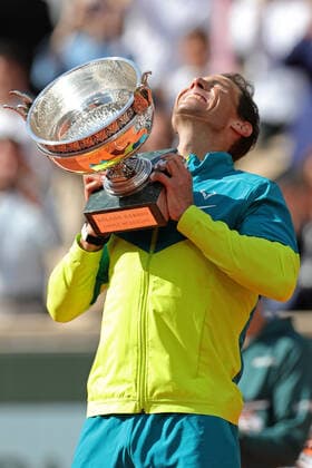 5th June 2022; Roland Garros, Paris, France: French Open Tennis tournament, mens singles final, Rafael Nadal versus Casper Ruud; Rafa Nadal (ESP) celebrates with the winner& x2019;s trophy after his match against Casper Ruud (NOR)  ActionPlus12397510 JonxBromley