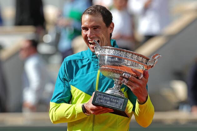 5th June 2022; Roland Garros, Paris, France: French Open Tennis tournament, mens singles final, Rafael Nadal versus Casper Ruud; Rafa Nadal (ESP) lifts the winner& x2019;s trophy after his win against Casper Ruud (NOR)  ActionPlus12397499 JonxBromley