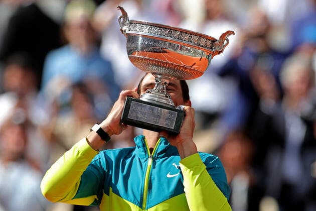 5th June 2022; Roland Garros, Paris, France: French Open Tennis tournament, mens singles final, Rafael Nadal versus Casper Ruud; Rafael Nadal (ESP) kisses the trophy after beating Casper Ruud (NOR) in the final  ActionPlus12397508 JonxBromley