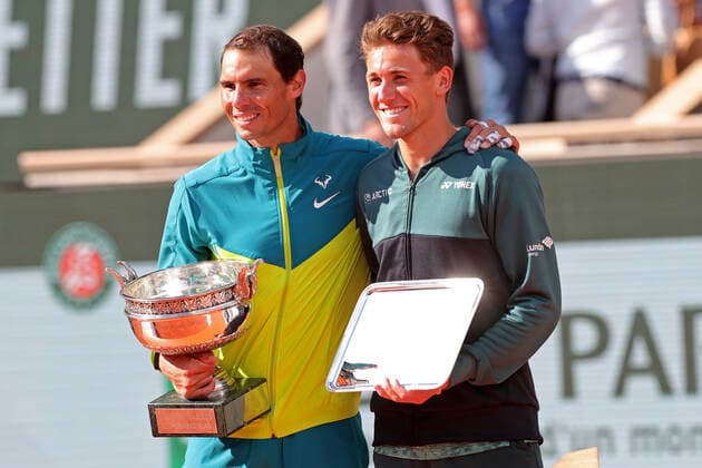 5th June 2022; Roland Garros, Paris, France: French Open Tennis tournament, mens singles final, Rafael Nadal versus Casper Ruud; Rafael Nadal (ESP) and Casper Ruud (NOR) with their trophies after their Mens Singles Final  ActionPlus12397606 JonxBromley