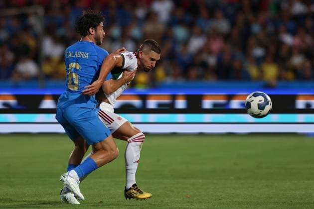 Cesena, Italy, 7th June 2022. Davide Calabria of Italy tussles with Zsolt Nagy of Hungary during the UEFA Nations League match at Stadio Dino Manuzzi, Cesena. Picture credit should read: Jonathan Moscrop Sportimage EDITORIAL USE ONLY. No use with unauthorised audio, video, data, fixture lists, club league logos or live services. Online in-match use limited to 120 images, no video emulation. No use in betting, games or single club league player publications. SPI-1722-0005