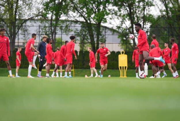 June 7, 2022, VANCOUVER, BC, CANADA: Canadian national men s soccer team forward Alphonso Davies, right, passes the ball during a training session for a CONCACAF Nations League match against Curacao, in Vancouver, on Tuesday, June 7, 2022. Canada s men s soccer team is back to training for the Thursday match, but the players say there s still work to be done on reaching a new deal with the s national governing body. A scheduled friendly against Panama on Sunday was cancelled after the Canadian team refused to play due to a labour dispute. Canada News - June 7, 2022 - ZUMAc35_ 20220607_zaf_c35_092 Copyright: xDarrylxDyckx