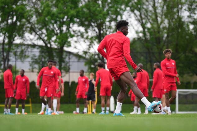 June 7, 2022, VANCOUVER, BC, CANADA: Canadian national men s soccer team forward Alphonso Davies, front right, passes the ball during a training session for a CONCACAF Nations League match against Curacao, in Vancouver, on Tuesday, June 7, 2022. Canada s men s soccer team is back to training for the Thursday match, but the players say there s still work to be done on reaching a new deal with the s national governing body. A scheduled friendly against Panama on Sunday was cancelled after the Canadian team refused to play due to a labour dispute. Canada News - June 7, 2022 - ZUMAc35_ 20220607_zaf_c35_099 Copyright: xDarrylxDyckx