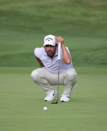 South Africa s Charl Schwartzel lines up a putt on the 18th green during the first round of the inaugural LIV Golf event at the Centurion club in Hertfordshire on Thurssday, June 09, 2022.The event is 12 teams of four players competing over 54 holes for a prize pot of $25million dollars to the winning team.  LON2022060933 HUGOxPHILPOTT