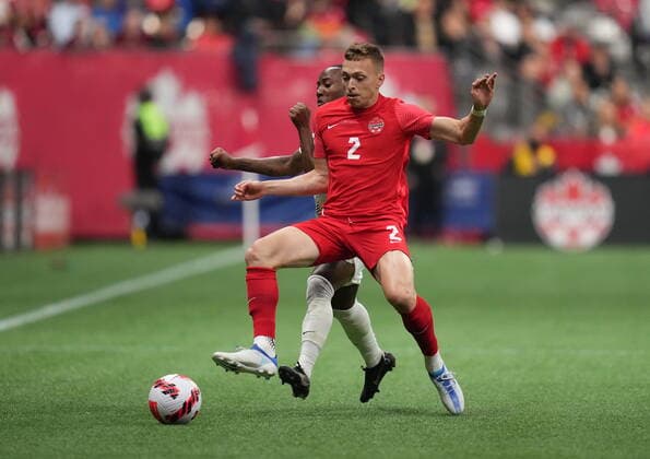 June 9, 2022, VANCOUVER, BC, CANADA: Canada s Alistair Johnston, front, and Curacao s Elson Hooi vie for the ball during the first half of a CONCACAF Nations League soccer match, in Vancouver, on Thursday, June 9, 2022. Canada News - June 9, 2022 - ZUMAc35_ 20220609_zaf_c35_158 Copyright: xDarrylxDyckx